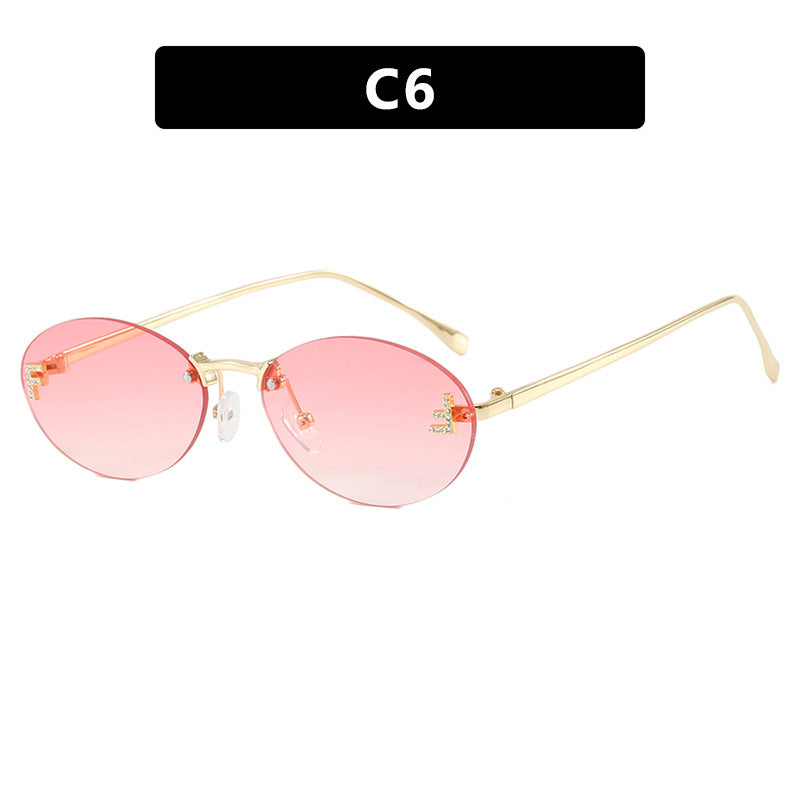 Letter F frameless cut edge sunglasses oval retro small frame women's fashionable metal sunglasses