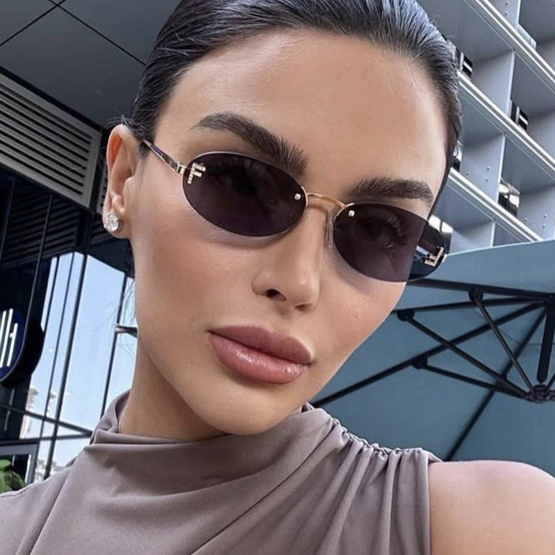 Letter F frameless cut edge sunglasses oval retro small frame women's fashionable metal sunglasses